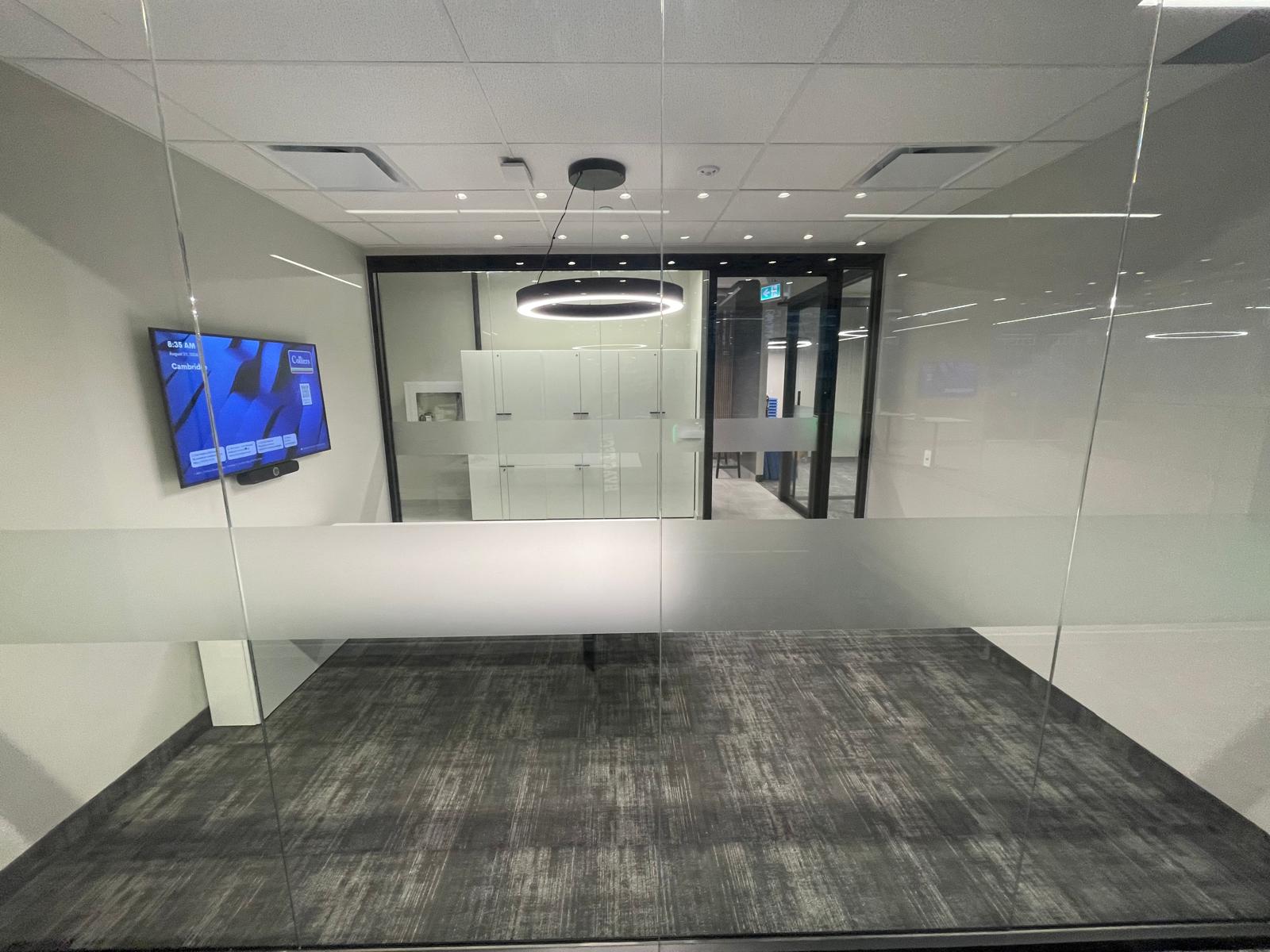 345 King Suite 200 presentation room viewed through full-height glass